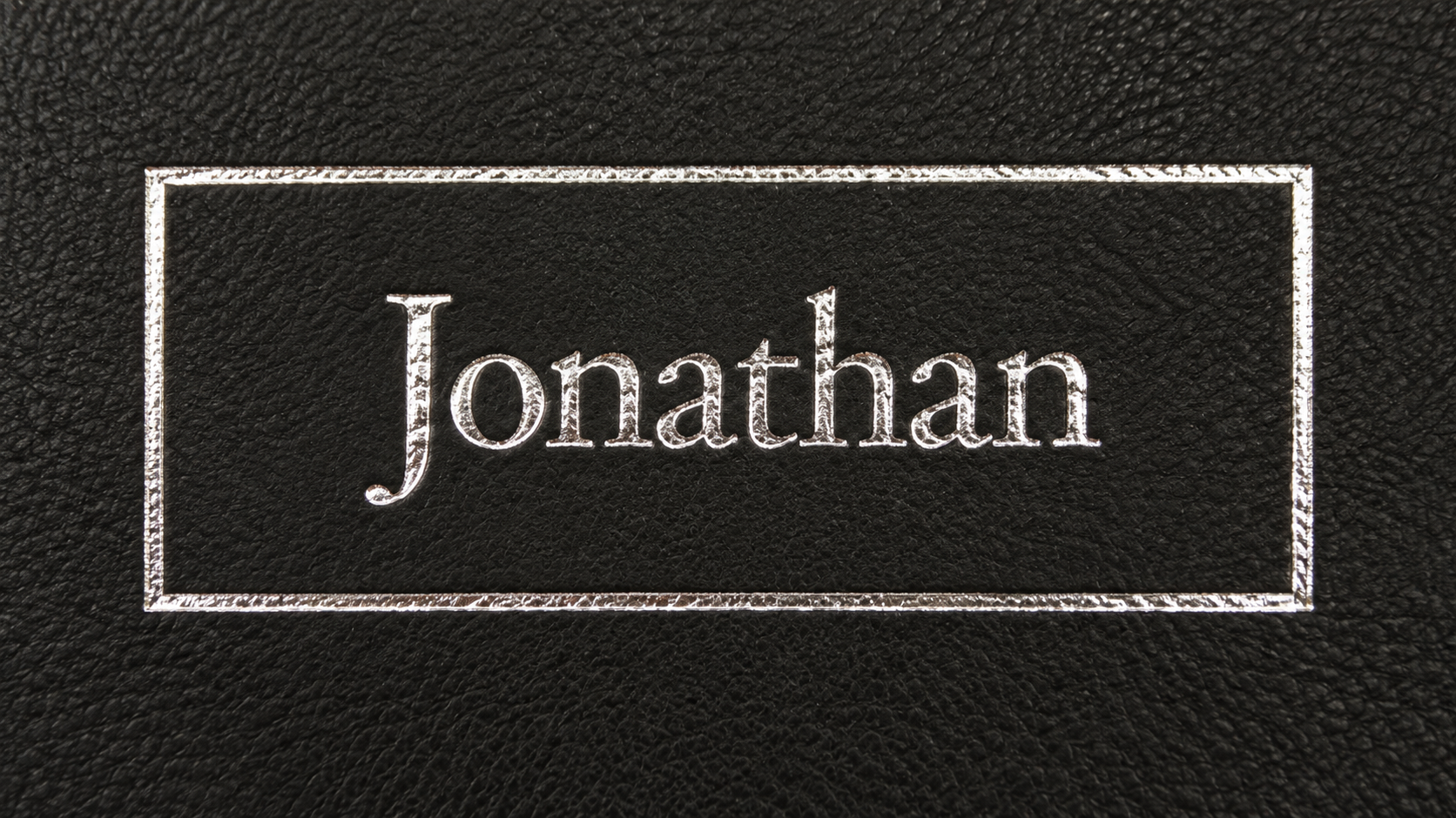 Foiled name Jonathan Capture your story with our quality handmade albums and online co-creation sessions